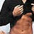 Static 48x48 pixel buddy icon showing a close-up of two people in an intimate embrace with visible skin tones and dark clothing, rendered at low resolution with heavy pixelation.