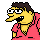 Yellow-skinned cartoon character with brown hair and white glasses wears red shirt, mouth opens from closed to wide in