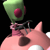 Pixelated image of a pink pig-like creature with a green avocado-shaped head and a single red eye, holding a black bicycle.