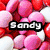Four distinct display candy-themed visuals with overlaid text: pink and red round candies, silver Hershey's Kisses, and partial text reading 'Sandy', 'Friggen', 'Loves', 'Chocolate'