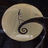 A static pixelated image of a light beige spiral shell with dark brown accents on a black background.