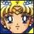 Pixelated close-up of a character with light brown curly hair, large dark eyes with white highlights, and a neutral expression against a multicolored background.