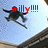 A pixelated image of a figure in mid-air with text overlays changing across frames.
