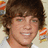 Pixelated portrait of a smiling person with brown hair, next to text reading 'I <3 Ryan Sheckler' on white background.