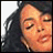 A 48x48 pixel buddy icon split into two sections: a left-side portrait of a person with dark hair and closed eyes, and a right-side green background with "Original Icons .com" text in stylized font.