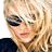 A 4-frame contact sheet of a celebrity-style animated icon showing different poses and angles of a woman with blonde hair, sunglasses, and makeup across four quadrants.