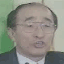25 animated frames showing a person in a dark suit and white shirt against green and light backgrounds with varying facial expressions