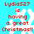 Red text on cyan background reads 'Lydia527 is having a great Christmas!!' with white snowflakes, animated to shift position between frames.