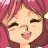 Pixelated anime-style icon of a character with pink hair and closed eyes winking, mouth open in a smile or laugh against a solid pink background.