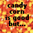 Pixelated text on a candy corn–patterned background with partial gray overlay.