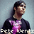Pixelated image of a person with dark hair wearing a black shirt over a purple graphic tee, standing against a light blue background with text reading "Pete Wentz" at the bottom.