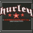 Pixelated text 'hurley' above three red stars and a horizontal bar, framed by double borders in gray or brown on dark background.