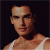 A pixelated image of a person in a white tank top against dark background, with green text reading 'Original Icons .com' on the right side.