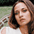 A static contact sheet of a Fiona Apple album promotion featuring text, partial portraits, and orange fruit on greenery against yellow backgrounds.