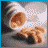 Pixelated image of a hand holding an egg with text about pills killing someone but dying of a broken heart.