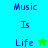 Pixelated text "Music Is Life" with a star symbol, displayed on alternating cyan and green backgrounds in two vertical