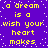 A static pixel art image with a purple background and white dots, displaying yellow text that reads "a dream is a wish your heart makes" in repeated lines.