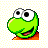 Pixelated green cartoon character with large white eyes and black pupils, orange lower body, open mouth showing red tongue, on light checkered background.