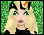 Pixelated image of a blonde character with green eyes, black hair clips, and an orange accessory against a green pixelated background.