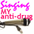 Pixelated image of a microphone with text 'Singing MY anti-drug' in varying pink and purple hues