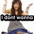 A woman with long brown hair in a gray dress and blue skirt raises her arms, overlaid with text fragments reading "I dont wanna", "change in", "lala land", "today", ". demi".