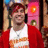 A pixelated image shows a person in a red jacket and white shirt with a pink background, next to text reading "Pete Wentz LOVES Alyssa" on a dark blue background.