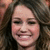 A static image of a person with long brown hair smiling, featuring a blue and black L-shaped graphic on the right side.
