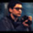 Pixelated static image of a character's face with blurred background, likely from an animated series or movie, rendered in low resolution at 256x256 pixels.