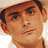 Animated contact sheet showing a sequence of frames featuring a man in a cowboy hat with changing facial expressions and hand gestures over text reading "I love Brad Paisley" on a red background.