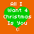 Green heart-shaped icon with white text "All I Want 4 Christmas Is You" and a smiley face on orange background.