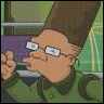 Animated character with tall brown hair, glasses, and a green uniform holding a microphone, set against a blurred background.