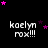 Black background with white text 'kaelyn rox!!!' repeated in a , surrounded by pink and purple stars in various positions