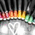 A pixelated static image shows a horizontal gradient of warm colors transitioning from pink to orange to yellow, with a green section on the right, all set against a dark background with scattered light speckles.