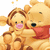 Pixelated cartoon of two teddy bears, one larger with red shirt holding a smaller bear, both smiling on white background.