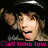 Pixelated image of a person with light brown hair wearing dark clothing, raising one arm against black background with pink text at bottom.