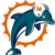 Pixelated teal dolphin leaping left to right within an orange jagged circular frame on white background, no visible text or additional elements.