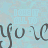 Animated icon with repeating dark brown cursive text on light blue background, featuring partial visible words 'ALL TO' and 'IT' in scattered positions.