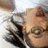 Pixelated image of a person with glasses lying down next to text reading SHUT YOUR FACE HOLE!!! in blocky black letters.