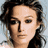 A 48x48 pixel animated contact sheet showing three sampled frames of a celebrity's face with varying color treatments and expressions, arranged in a 2x2 grid on a gray background.