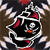 Pixelated static icon of a cartoon character with black face, white outline, red accents, and orange beak-like mouth against brown background.
