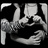 Black-and-white pixelated image of two people embracing, accompanied by stylized text about missing someone.