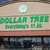 A split-screen image with a blurred storefront on the left and pink text on blue background reading "ya thats right i shop at dollar tee" on the right.
