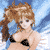 Pixelated image of a person with light brown hair in a ponytail wearing a black bikini top against a blue sky background.