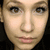 A four- shows a person's face with subtle expression changes , including mouth position and eye openness variations