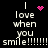 Pixelated text reads "I love when you smile!!!!!!" with pink heart and starburst symbols on black background.