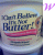 A butter container with 'Can't Believe It's Not Butter!' text, red stripe, and partial purple 'WOW' letters on the right side.