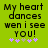 Green background with black pixelated text reading 'My heart dances when I see you!' and five purple/pink plus signs below, with one sign changing color between frames.