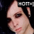 A pixelated image of a person with dark hair and heavy eye makeup, shown in three with text overlays reading HOTT=), BILLY M<3, and SEXYY=