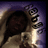 A pixelated image shows a figure with dark hair and light skin holding a glowing object against a purple background.