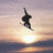 Pixelated image of a snowboarder mid-air against a sunset sky with text reading "I Love Snowboarding" on the right side.